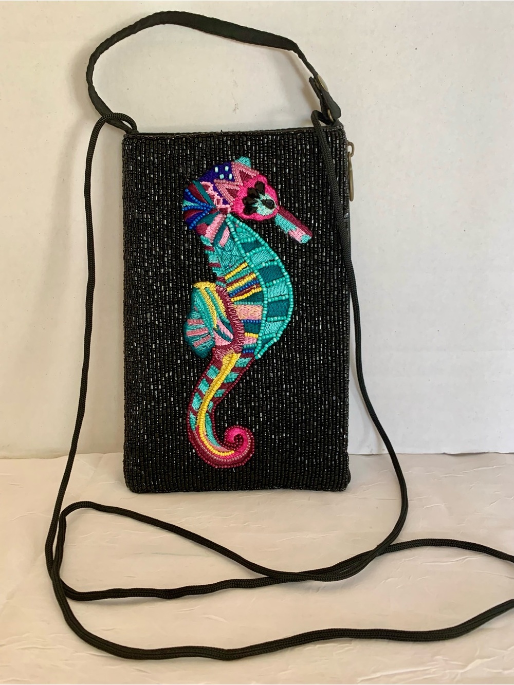 Bamboo Trading Company beaded Black Crossbody club Bag with Colorful Seahorse.